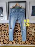 Jasne jeansy G-Star RAW type-C low boyfriend z rozdarciami na kolanach