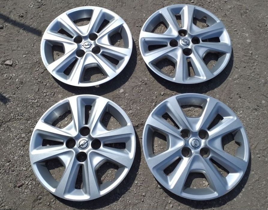 Orginalne kołpaki Opel Corsa E struktura 15 cali