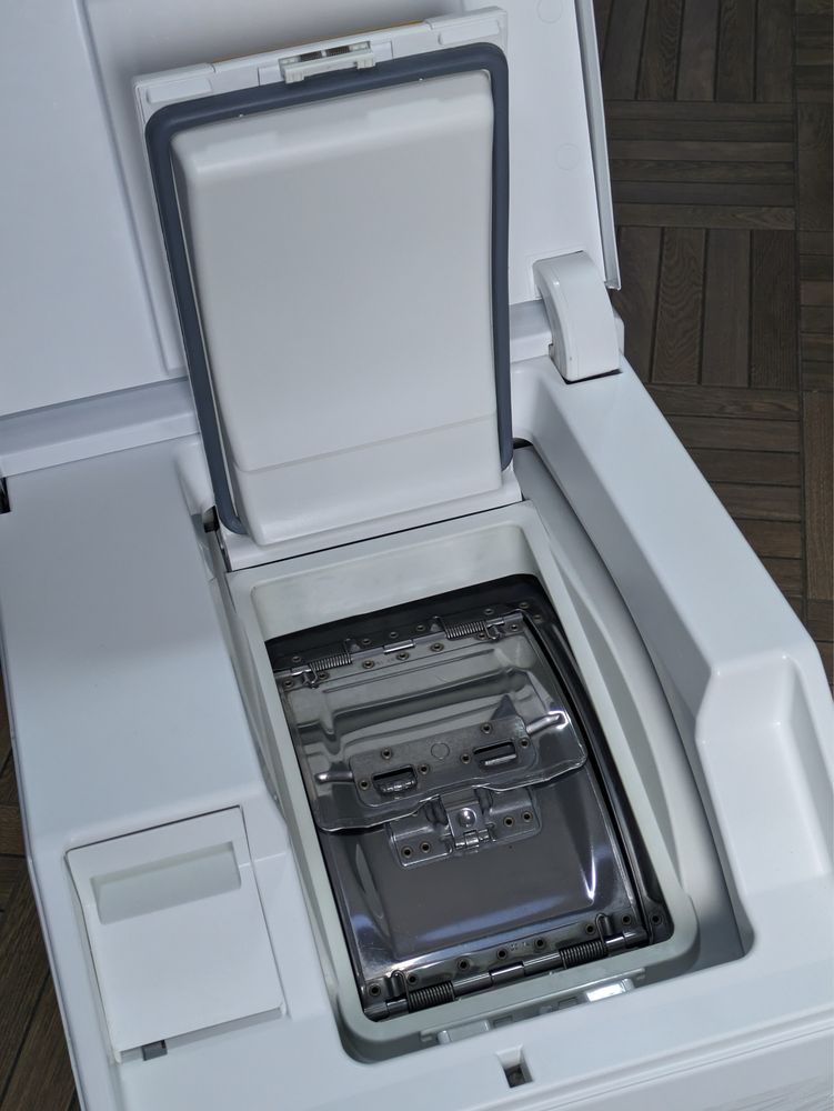 Пральна машина в верхнім завантаженням Miele W668