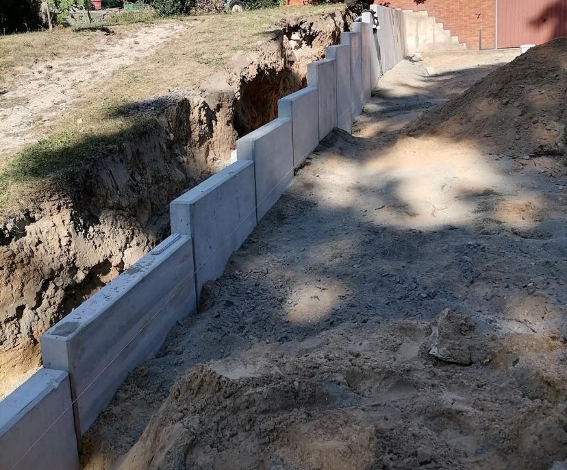 Układanie murów oporowych typu L