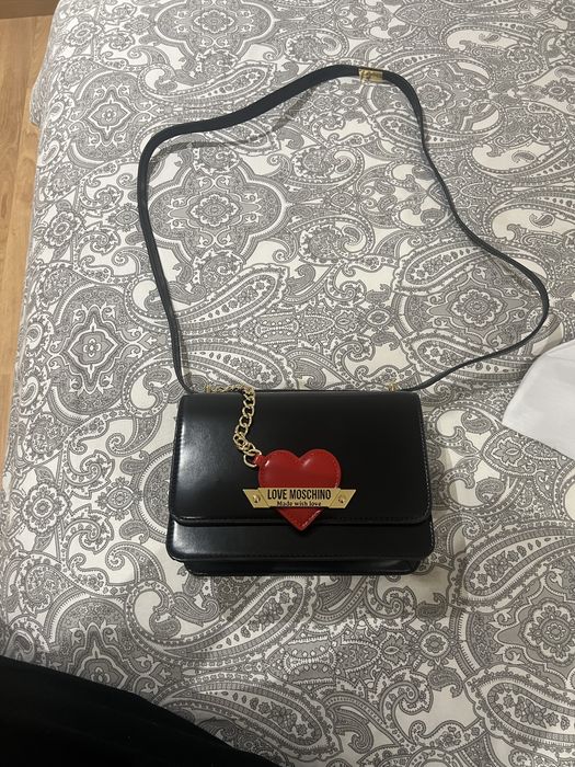 Bolsa Moschino como nova