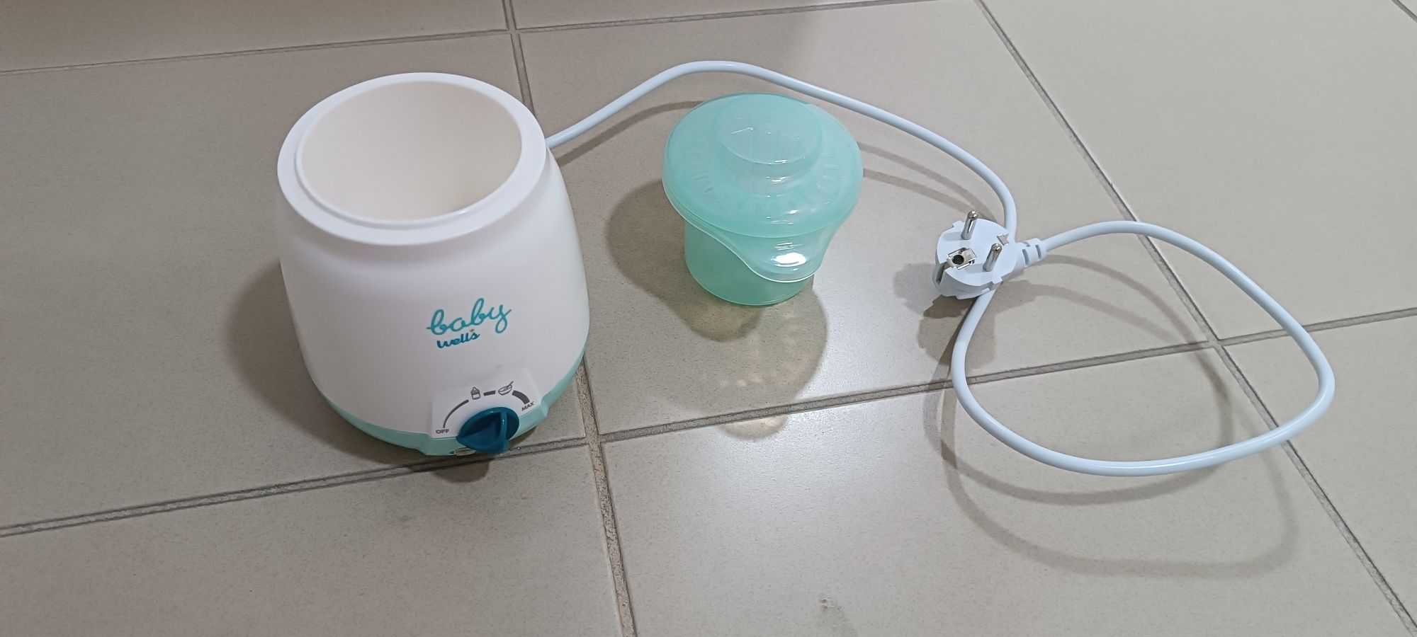 Conjunto esterilizador e aquecedor de biberões