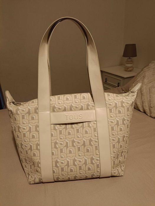 MALA TOUS com certificado de garantia e autenticidade