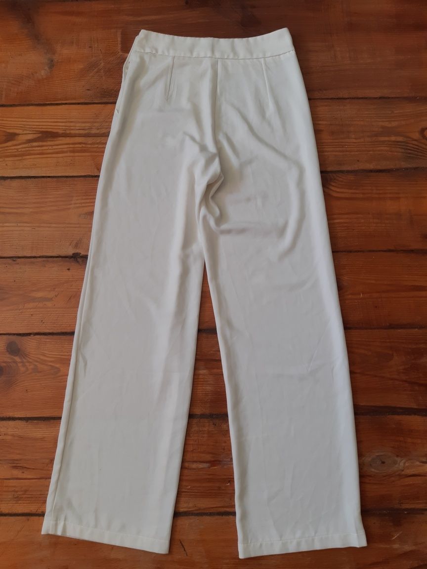 Białe proste szerokie luźne spodnie wysoki stan 36 S