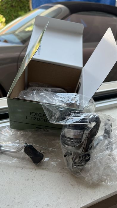 carreto daiwa exceler 2000