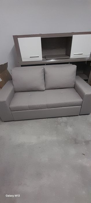Sofá completamente novo, que abre e faz uma cama de casal.