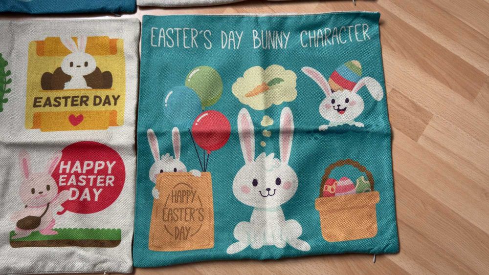 Zestaw czterech ozdobnych wielkanocnych poszewek 45x45