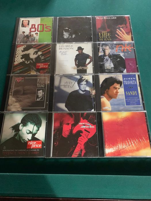 Cds de música anos 60 e 80.