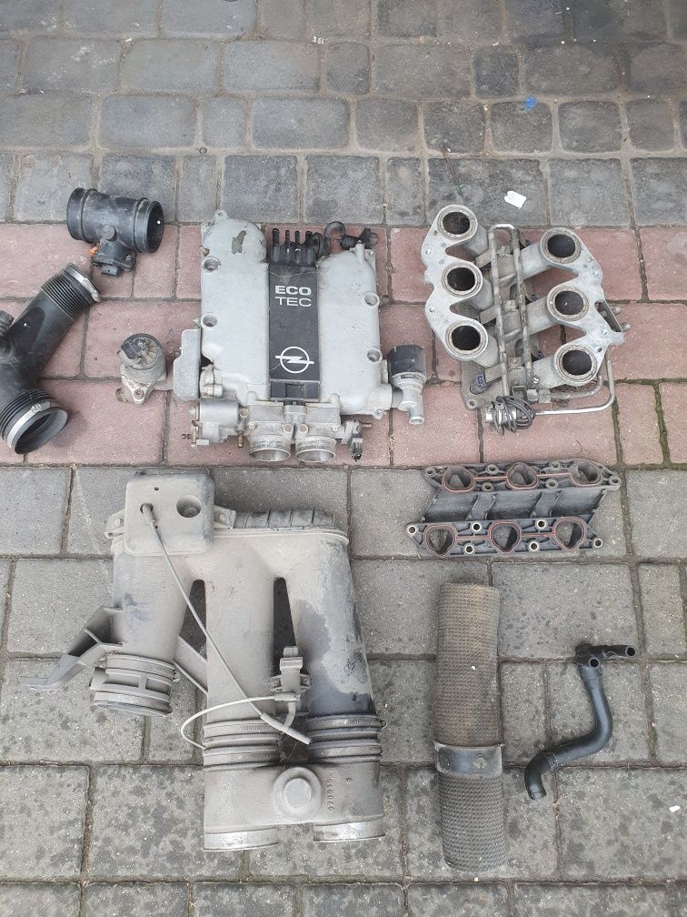 Krótki kolektor ssący Opel Omega 2,5 V6