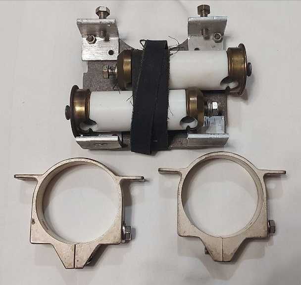 Кріплення та керування до вакуумних конденсаторів