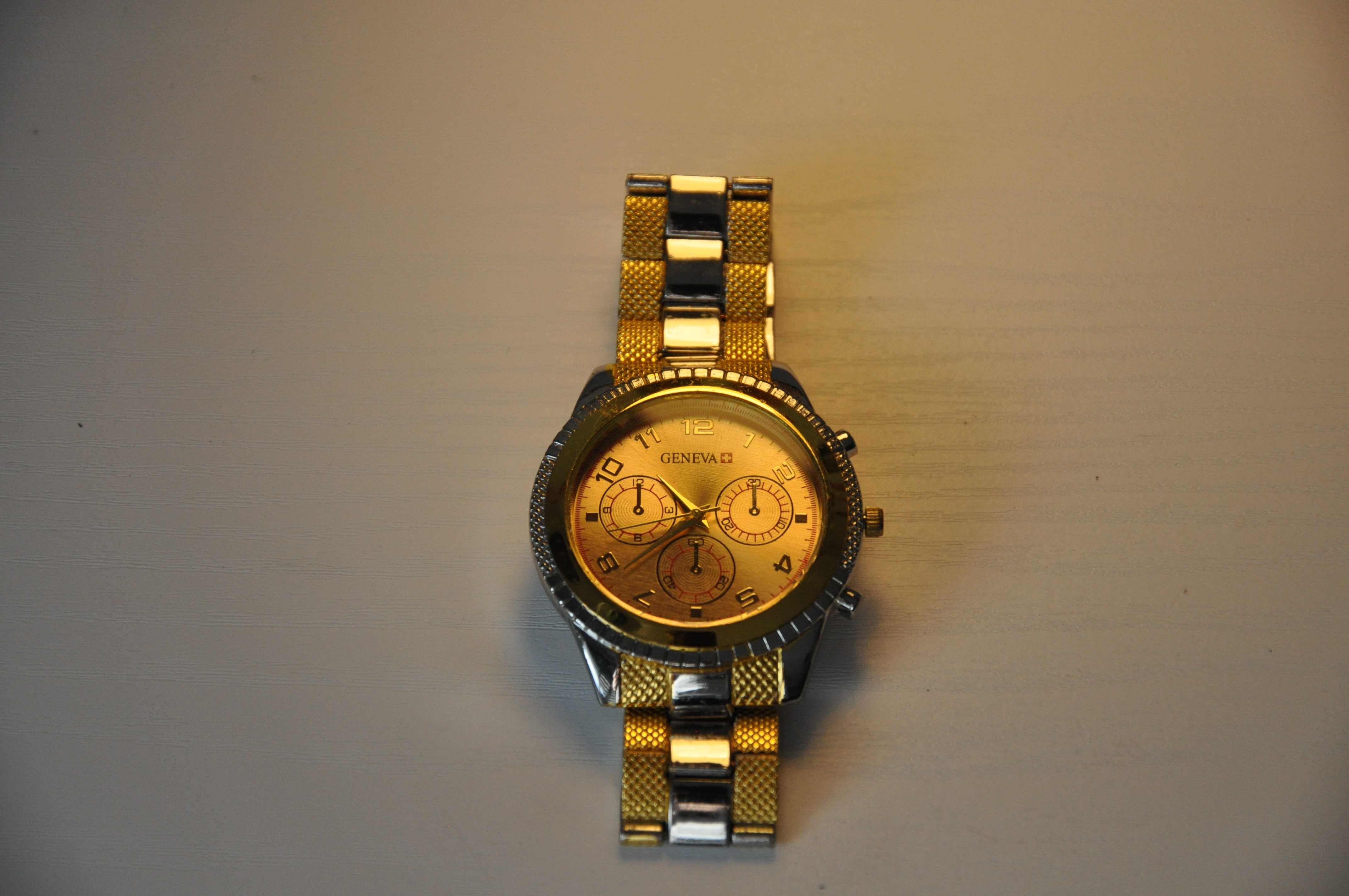 Męski zegarek Geneva - elegancki, złoty, srebro-złoty, kwarcowy, bdb