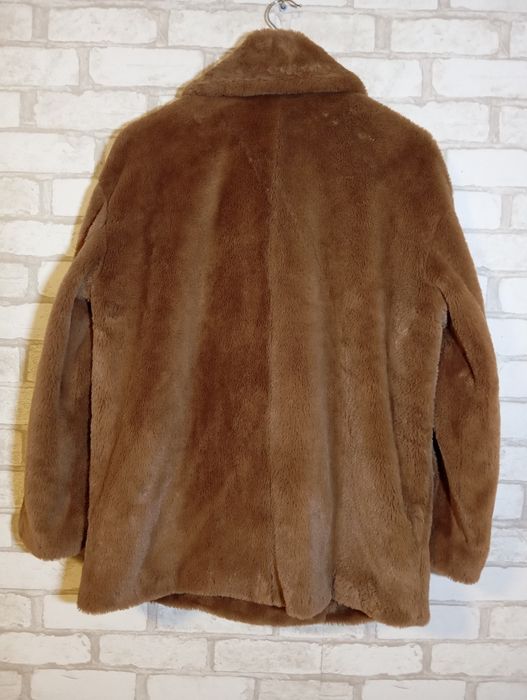 Кожушок зі штучного хутра колір кава з молоком. 46-48