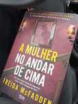 A mulher no andar de cima