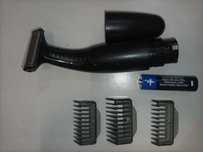 Aparador  cabelo/barba e corporal marca  Remington a pilhas com pentes