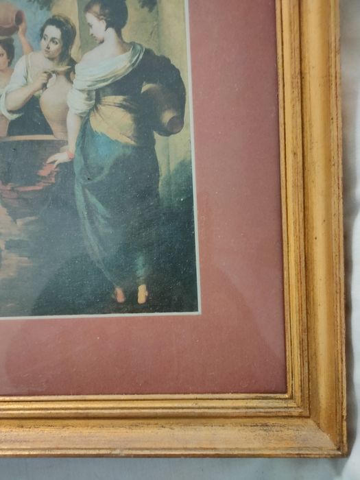 Moldura com cópia de pintura de Murillo.