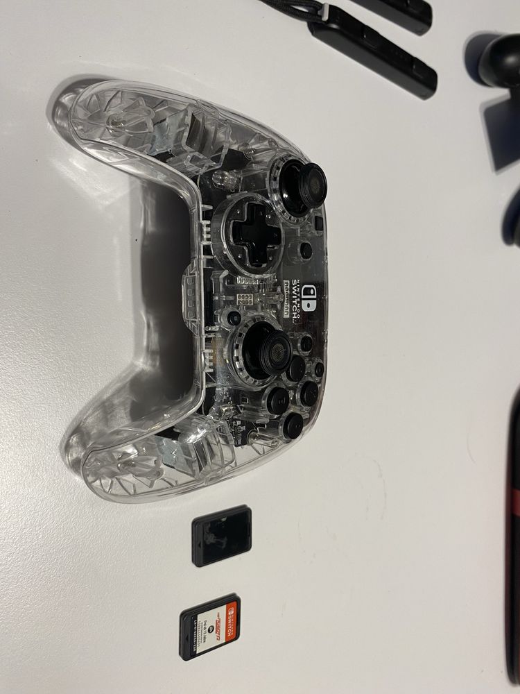 Nintendo Switch + Pro Controller + dużo gier (Cuphead, NFS, Rayman)