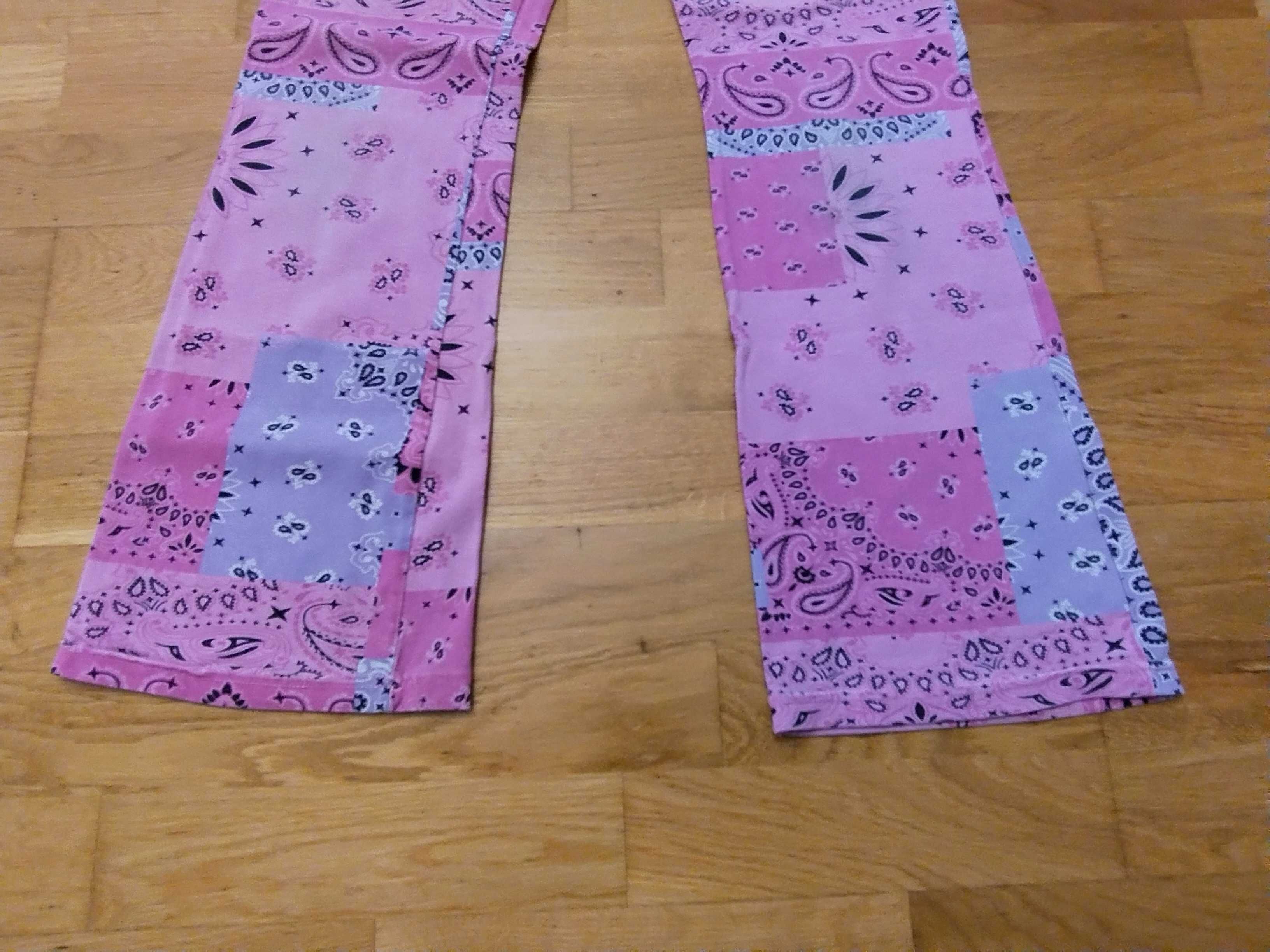 Legginsy dzwony Coccodrillo 158 spodnie materiałowe dziewczęce różowe