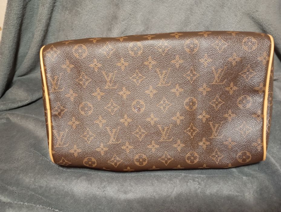 Brązowa torebka ze wzorami