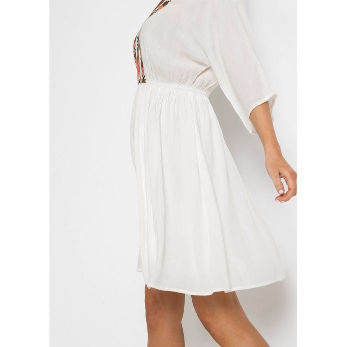 kreszowana sukienka z haftem 44-46 x