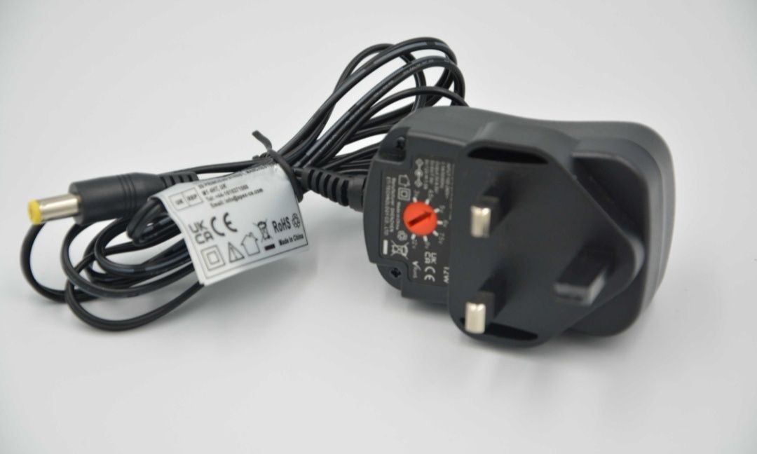 Zasilacz uniwersalny 3-12V 1A 8 końcówek anglik plus adapter na pl