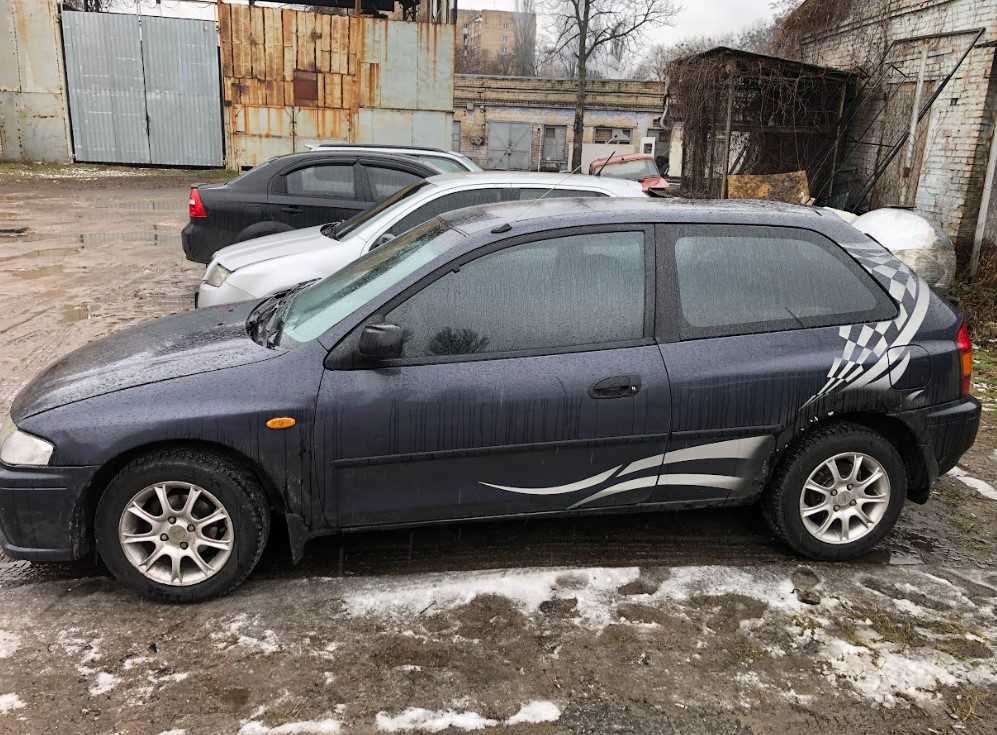 MAzda 323. 1998. Купе