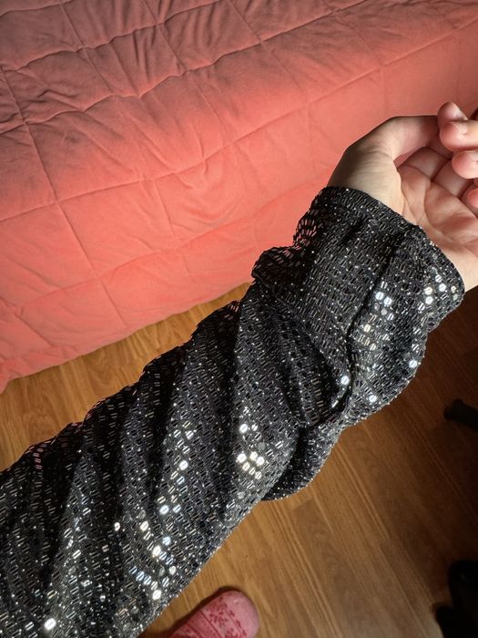 Macacão brilhante novo