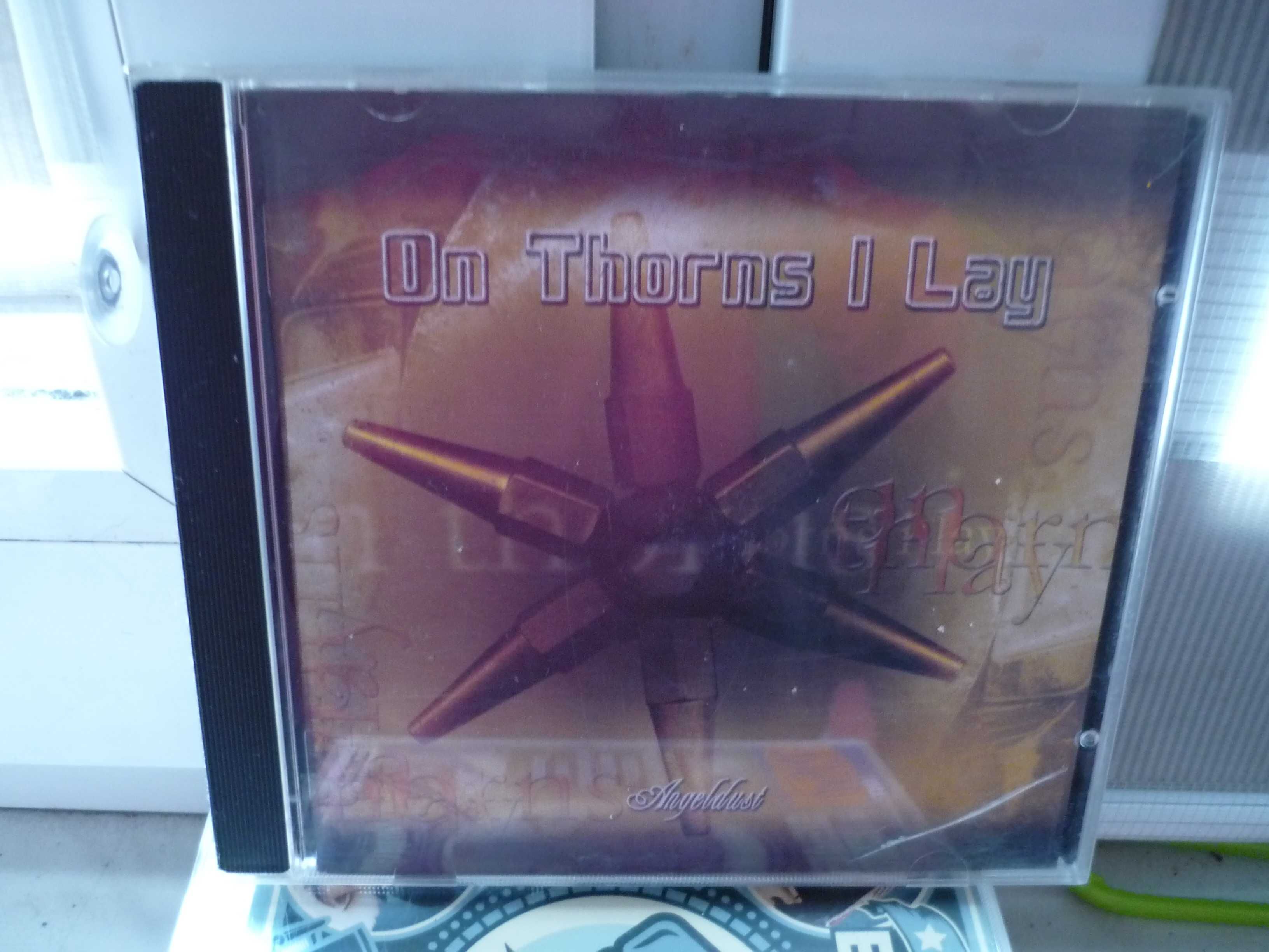 On Thorns I Lay , Angeldust , CD.