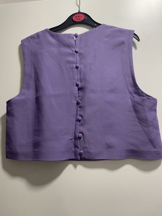 Top- completamente novo