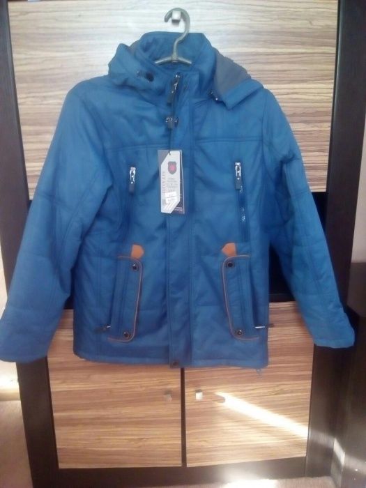 Нова куртка 42 розміру