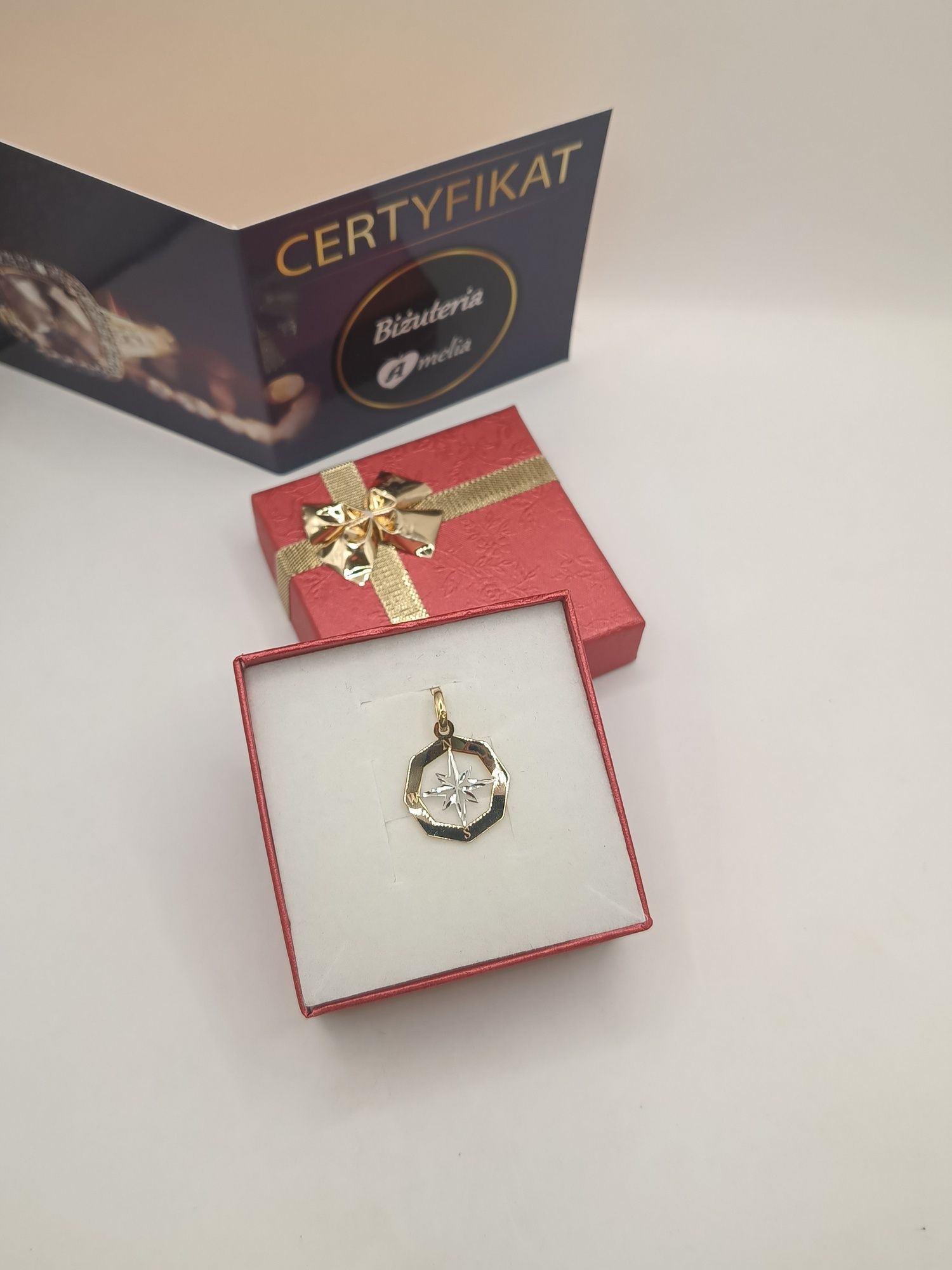 Złota zawieszka gwiazda północy  żółto białe złoto pr 585 14 karat