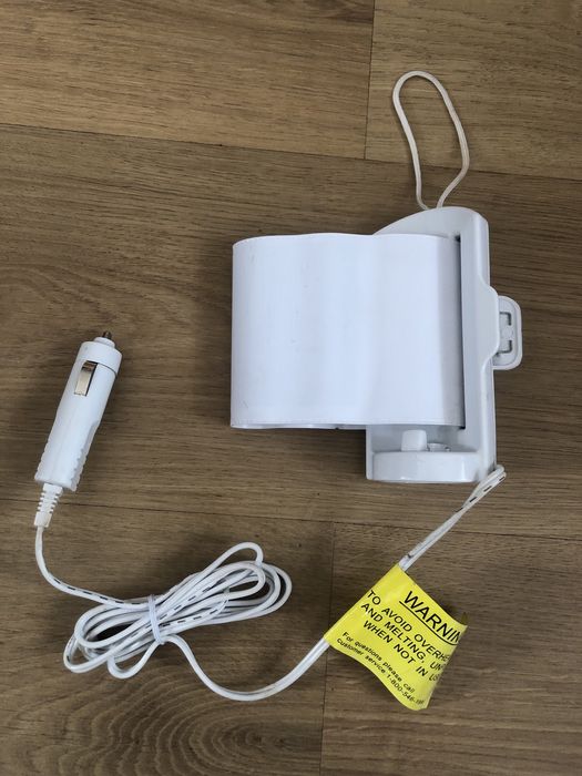 Підігрівач для пляшечок для машини