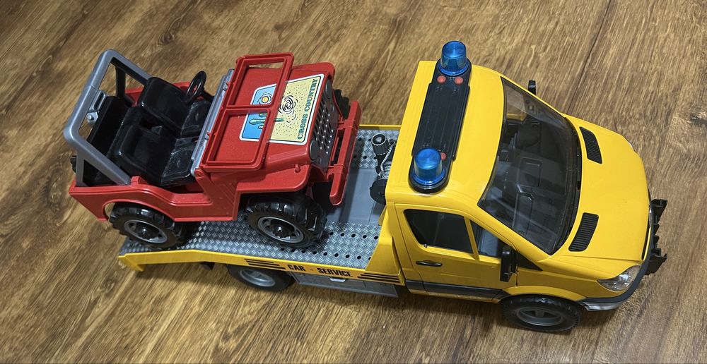 bruder машина эвакуатор с джипом
