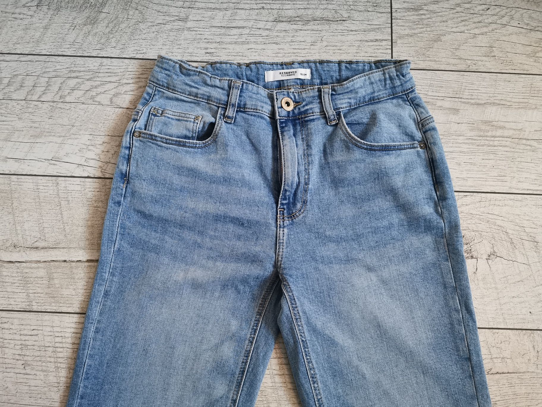 Spodnie jeansowe Reserved rozm. 152