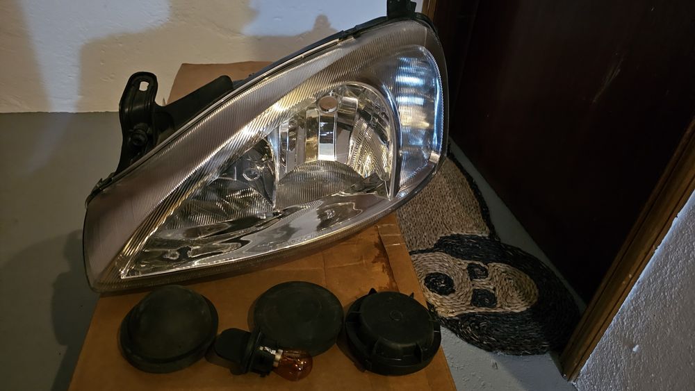 Óptica esquerda Corsa C