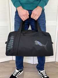 Спортивна дорожня сумка Пума. Декілька кишень та посилене дно