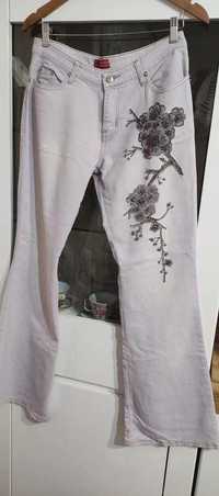 Spodnie jeansy liliowe fiolet dzwony kwiaty wzory koraliki