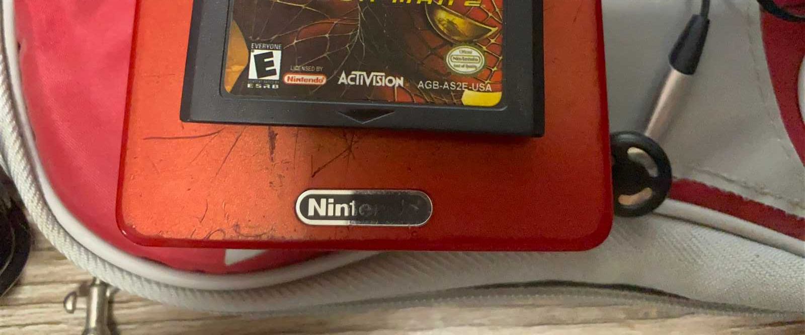 GameBoy Advance SP з зарядним пристроєм, 2 зарядних, гра, навушники