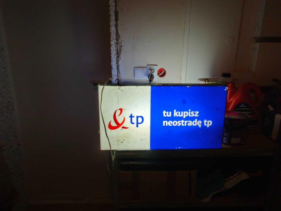 Stary szyld reklamowy lampa neon Telekomunikacja Neostrada TP
