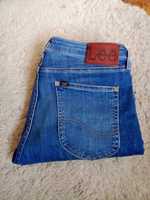 Ciemno niebieskie spodnie jeansowe Lee