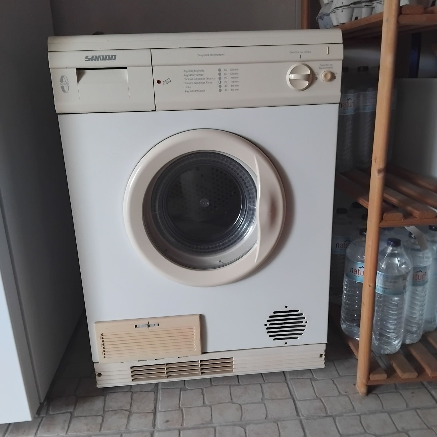 Máquina de secar roupa