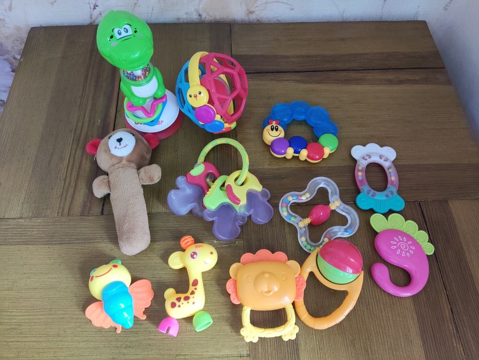 Брязкальця, погремушки, грызунки, пазлы