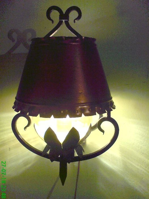 Lampy - kowalstwo artystyczne stylowy kinkiet i duża lampa wisząca