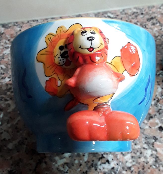 Caneca e malga do Leão