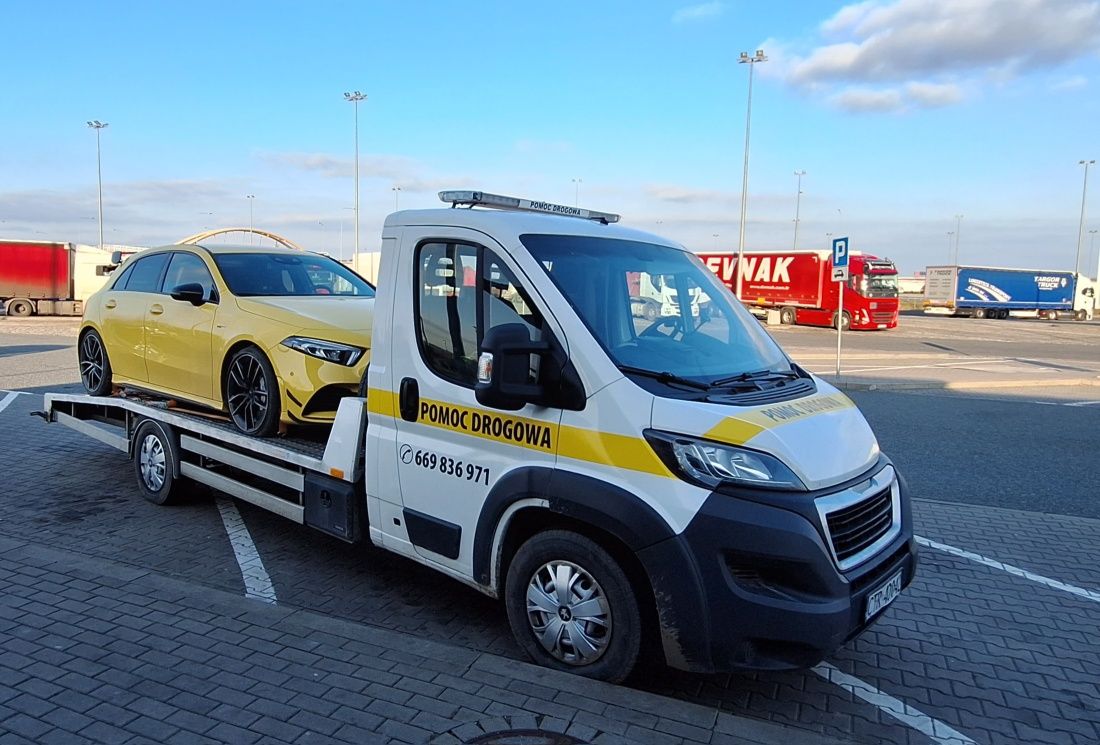Autolaweta laweta Pomoc drogowa Holowanie Toruń 24/7  laweta