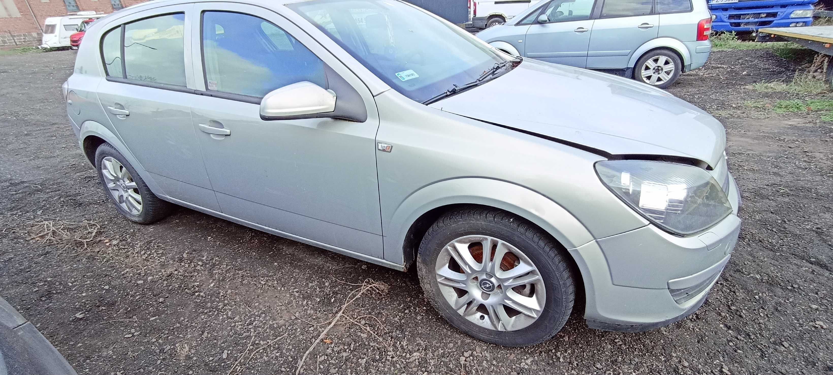 błotnik przód przedni opel astra h lak z167