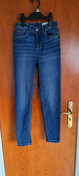 Spodnie jeansowe 152 stan idealny
