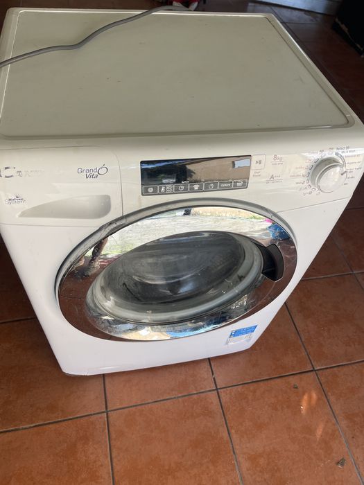 Máquina de lavar roupa Candy 8kg com fuga de água