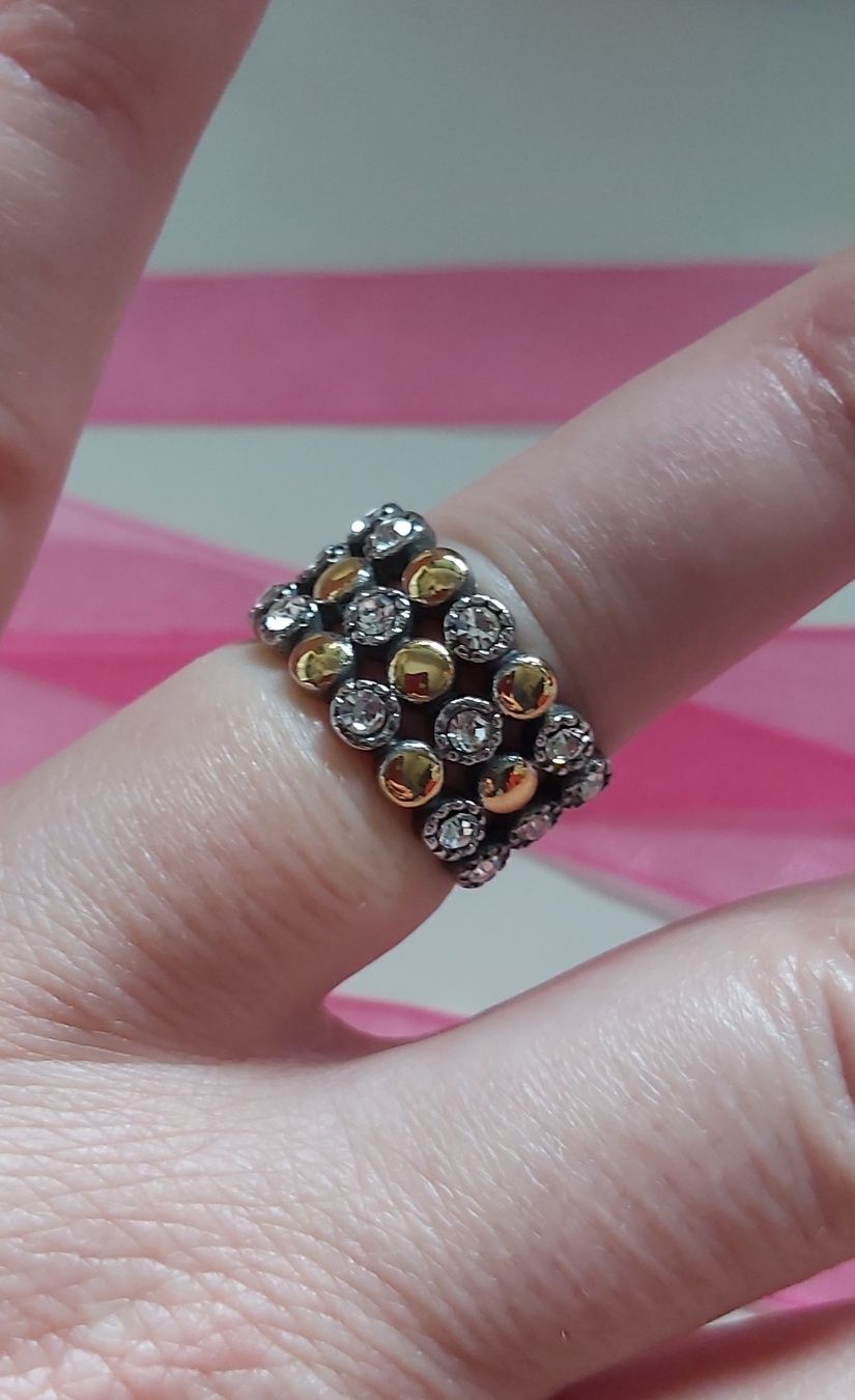 Anel bicolor, em aço, com zirconias. T17