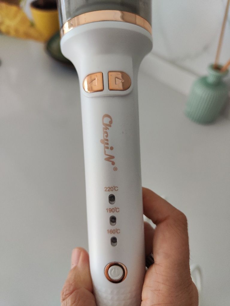 Modelador de cabelo automático