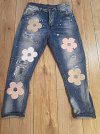 Spodnie jeansowe kwiaty dywanowe